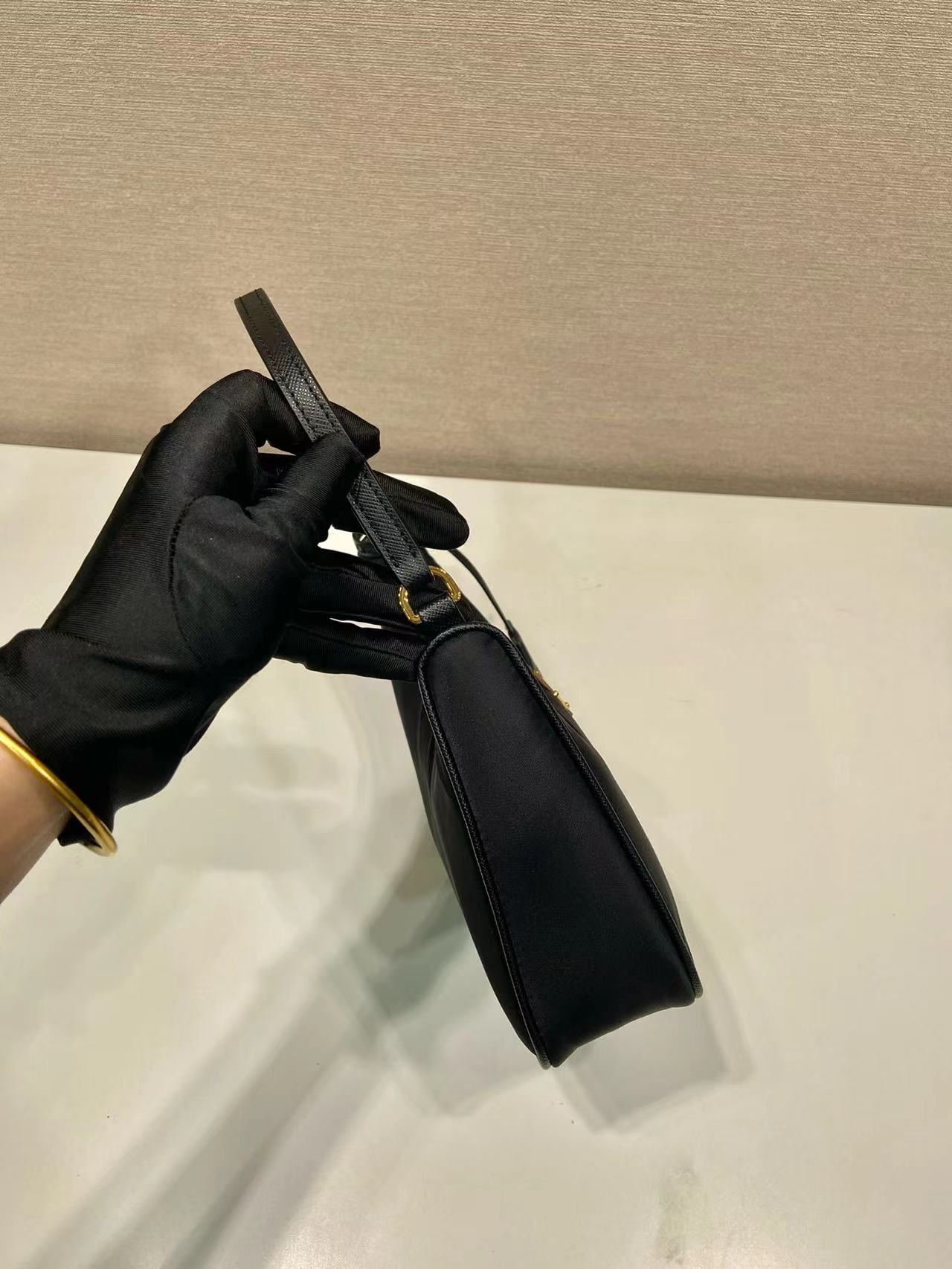 Prada Re-Nylon and brushed leather mini-bag 1BC515 black Prada Re-Nylon and brushed leather mini-bag 1BC515 black