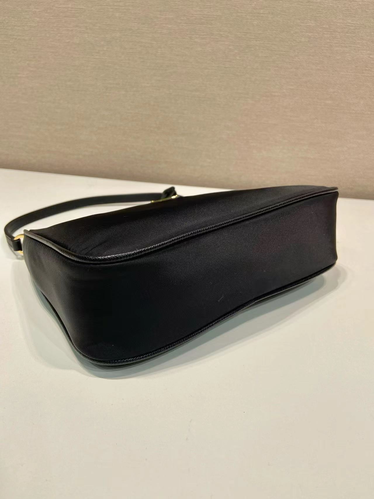 Prada Re-Nylon and brushed leather mini-bag 1BC515 black Prada Re-Nylon and brushed leather mini-bag 1BC515 black