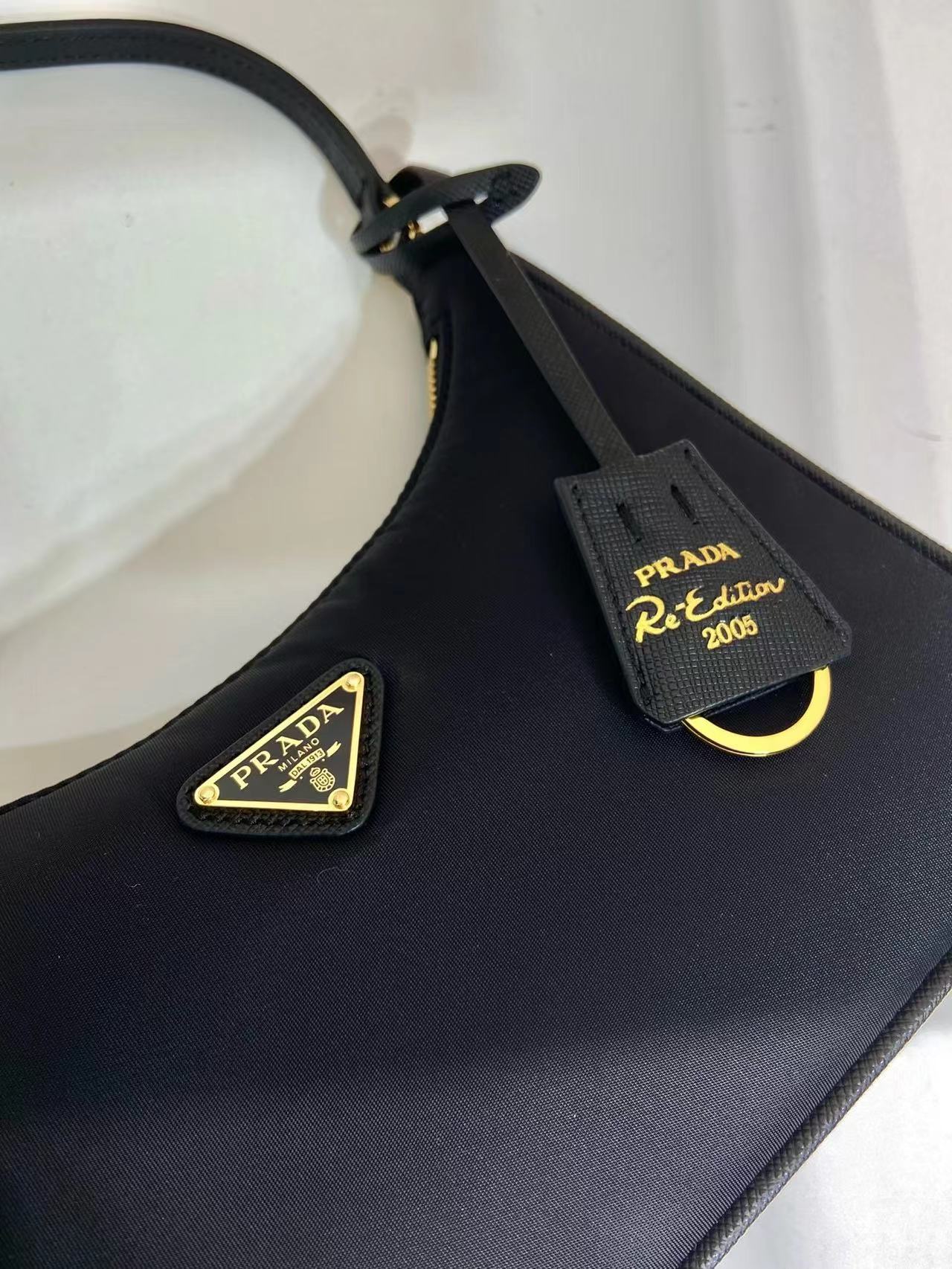 Prada Re-Nylon and brushed leather mini-bag 1BC515 black Prada Re-Nylon and brushed leather mini-bag 1BC515 black